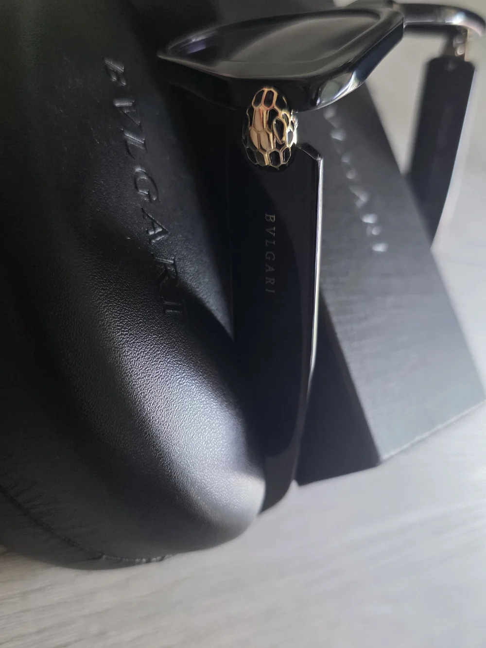 Bulgari Black Cat-Eye Sunglasses with Gold Accent